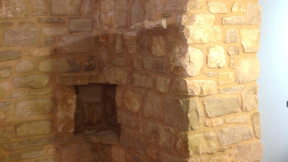 Villa rivestimento in pietra lavorazione Pietra di Credaro stilata con bio calce naturale